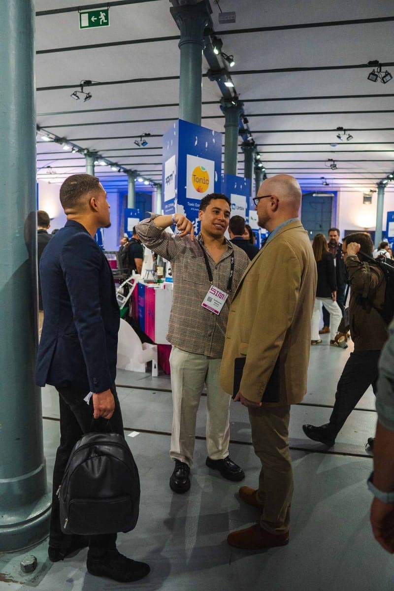 Norruva team members in partner conversations at Startup Portugal SIM 2026